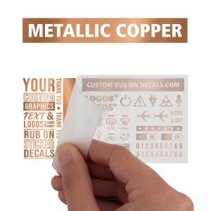 A person is holding up a piece of paper with a Custom Dry Rub on Transfer.