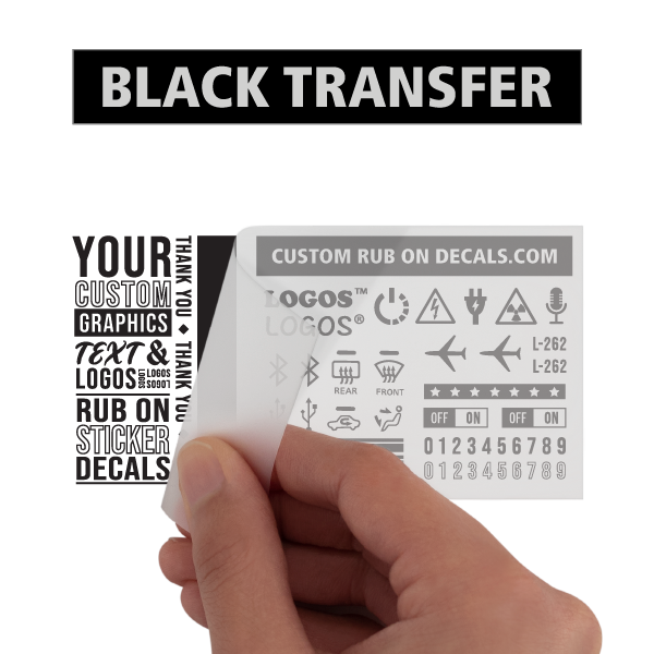 A hand holding a Black Custom Dry Rub on Decal Transfers with a Deep Rich Satin Finish sticker. (Keywords: custom rub on transfers)