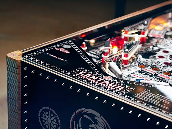 A close up of a pinball machine with custom rub on transfers. A close up of a pinball machine with custom rub on transfers.