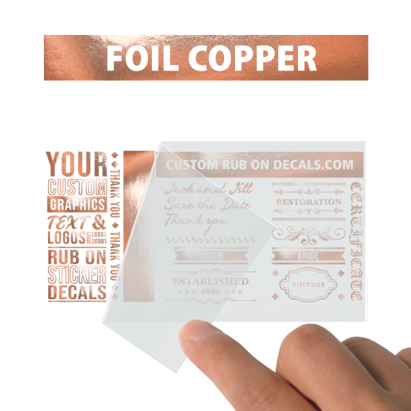 A person is holding up a card with the word foil copper on it.
